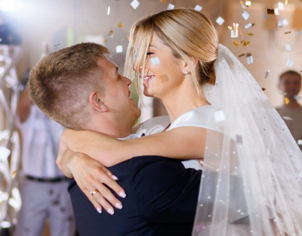 Bride Couple Waving While Dacning at Wedding Disco in Milton Keynes
