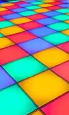 Colourful retro-style LED dance floor with vibrant lighting ready for a wedding party.