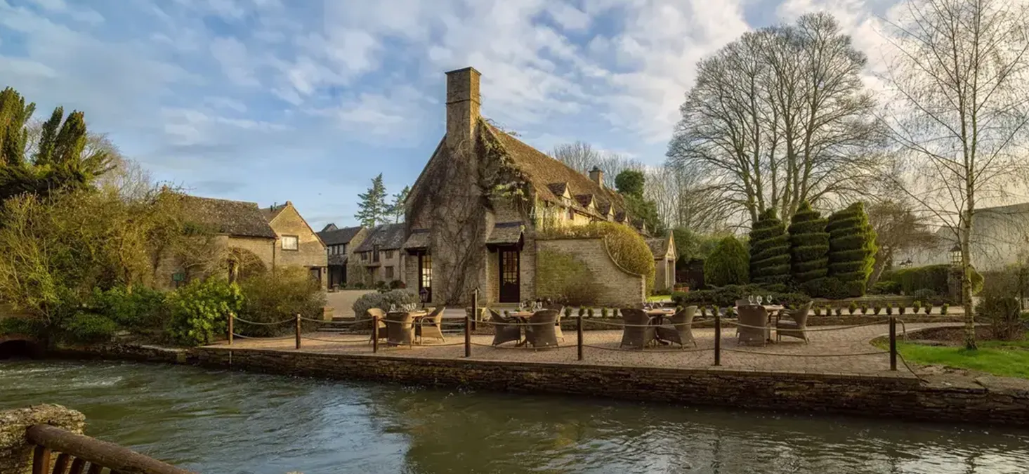 Minster Mill wedding venue with riverside terrace, ideal setting for a luxury wedding DJ.